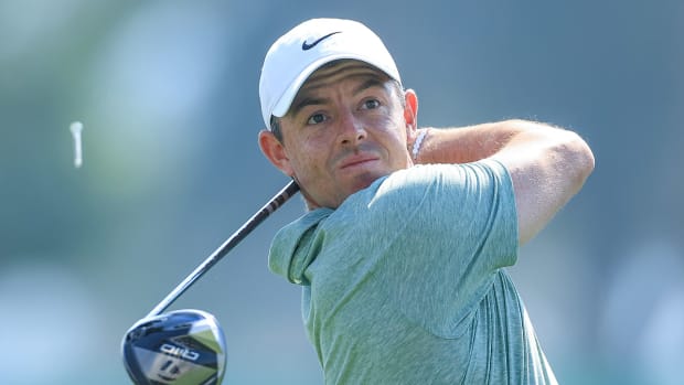 Rory McIlroy of Northern Ireland plays his tee shot on the third hole on Day One of the Dubai Invitational at Dubai Creek Golf and Yacht Club on January 11, 2024 in Dubai, United Arab Emirates. 